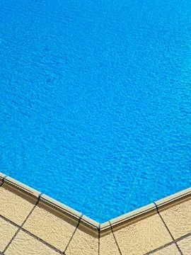 Corner of a swimming pool Stock Photos