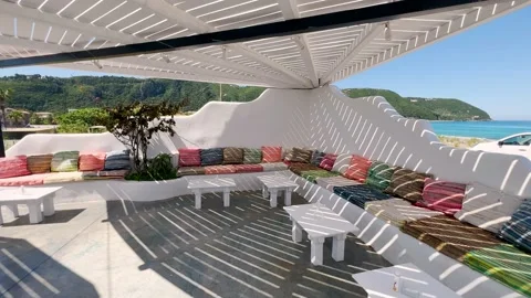 Corner of terrace with colorful sofas and pillows on the beach Vídeos de archivo 203819307
