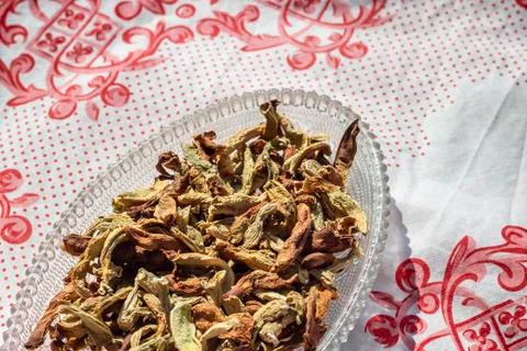 Corner top shoot of dried string beans on tranparent plate Stock Photos