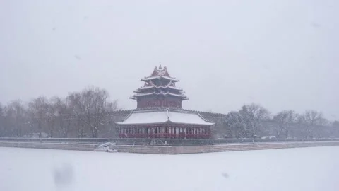 Corner tower of Forbidden City stands in heavy snow, Beijing, China. Stock Footage 170608286