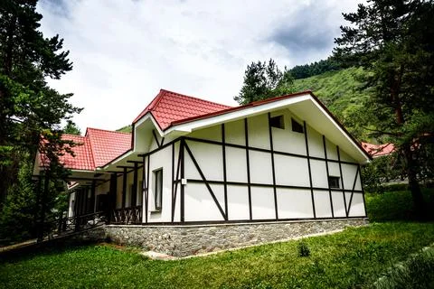 Corner view on one-storey private residential house with half-timbered Stock Photos