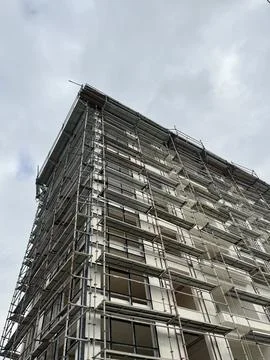 Corner view of scaffolding for facade insulation Stock Photos