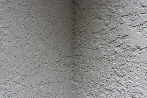 Corner of a white textured wall surface 스톡 사진