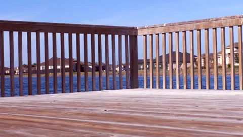 Corner of a wood deck in the water of a subdivision Stock Footage 316067118
