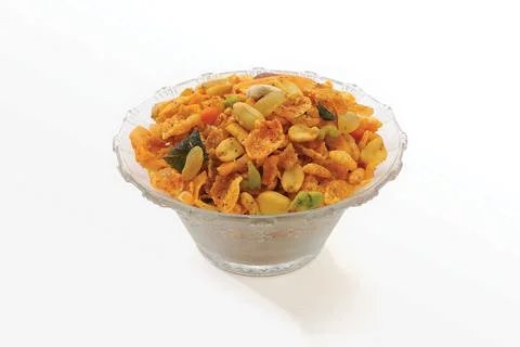 Cornflake Chivda or Corn Chiwda loaded with peanuts and Cashew. Served in a b Stock Photos