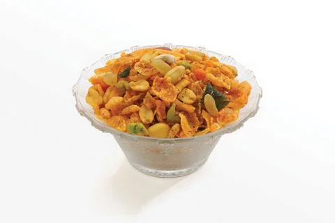 Cornflake Chivda or Corn Chiwda loaded with peanuts and Cashew. Served in a b Stock Photos