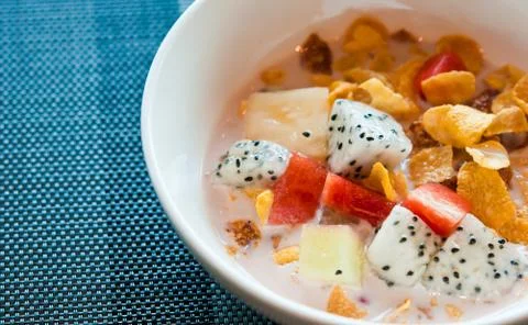 The cornflake with fruit and milk Stock Photos
