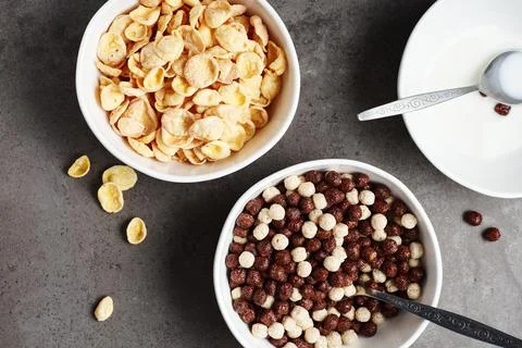 Cornflakes and chocolate balls. Stock Photos