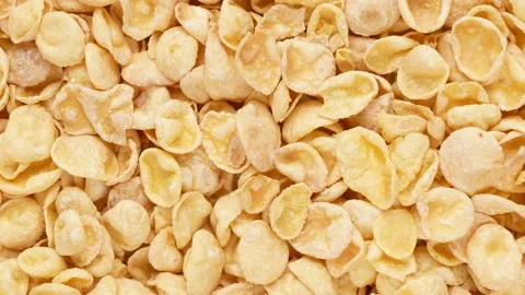 Cornflakes - background. Glazed flakes, dolly shot. Stock Footage 165557494
