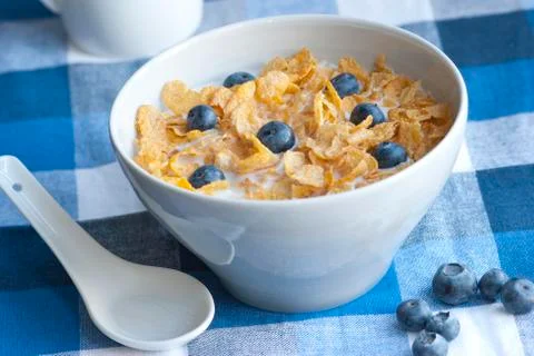Cornflakes with blueberries Stock Photos