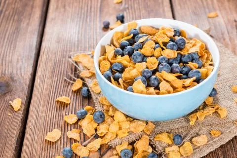 Cornflakes with blueberries Stock Photos