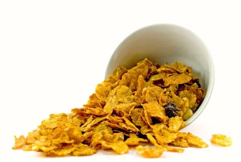 Cornflakes from bowl Stock Photos