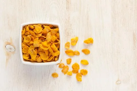 Cornflakes in bowl Stock Photos