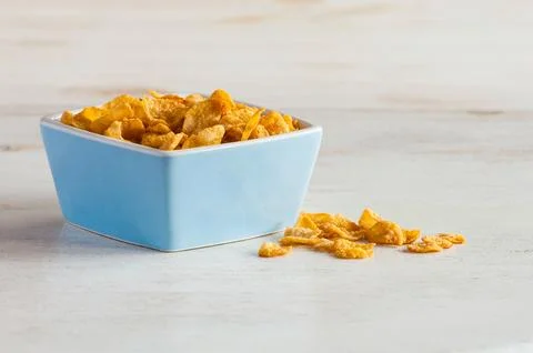 Cornflakes in bowl Stock Photos