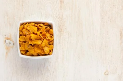 Cornflakes in bowl Stock Photos