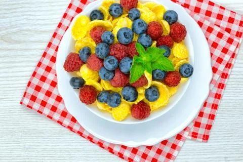 Cornflakes, breakfast of cornflakes and berries Stock Photos