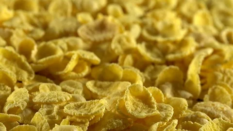 Cornflakes close-up with slow panning sliding motion. Concept of breakfast meal. Stock Footage 73478394