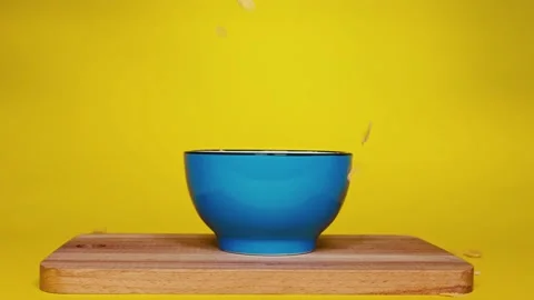 Cornflakes falling in the bowl FHD Stock Footage 147038531