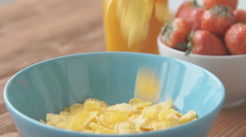 Cornflakes falling up from breakfast bowl Stock Footage 68951867