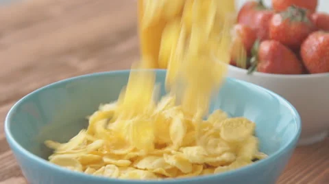 Cornflakes falling up from breakfast bowl Stock Footage 68951998