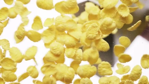 Cornflakes falling on a transparent background, bottom view. 스톡 동영상 156201451