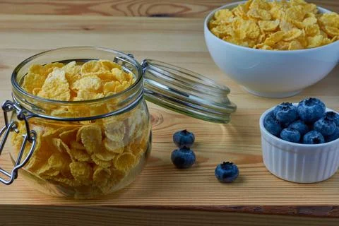 Cornflakes with milk for breakfast. Stock Photos