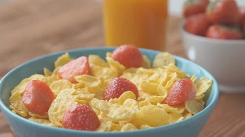 Cornflakes with milk splash in a bowl Stock Footage 68953254