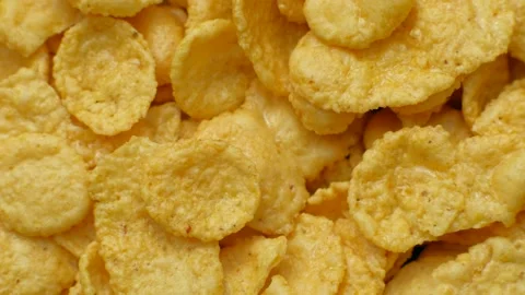 Cornflakes rotating, close up, top view Stock-Footage 143010306