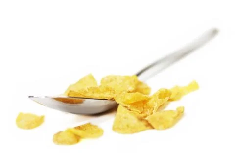 Cornflakes with spoon Stock Photos