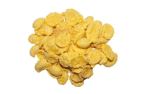 Cornflakes.Ready-made breakfast of cornflakes.Cornflakes background. Stock Photos