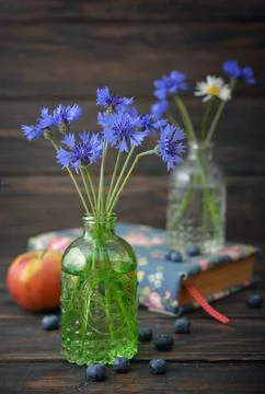 Cornflowers in bottle 写真素材