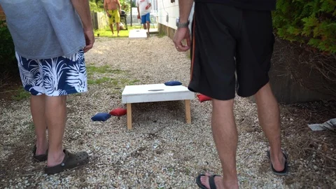 Cornhole perfect shot, hole in one Stock Footage 97698654