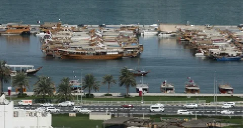 Corniche street with in the Dhow Harbor in Doha Qatar Stock Footage 121844451