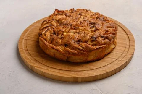 Cornish apple pie top view on rustic style white background. Copy space for your Stock Photos