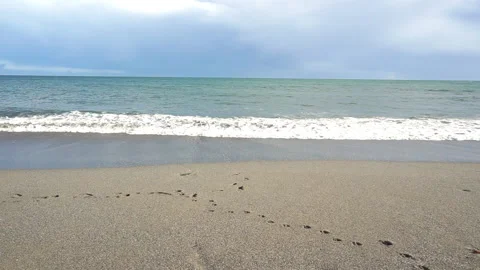 Cornish Beach with waves lapping on the beach part 3 of 4 Stock Footage 146714683