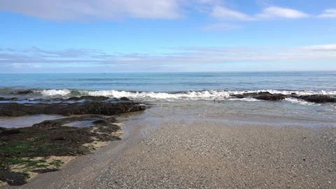 Cornish Beach with waves lapping on the beach part 4 of 4 Stock Footage 146714695
