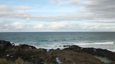 Cornish coast small waves on the rocks Stock Footage 33979131