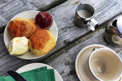 Cornish cream tea in the garden cafe speciality typical afternoon meal scones Stock Photos