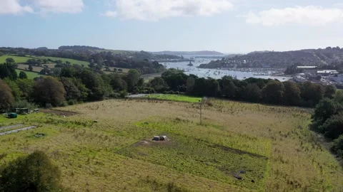 Cornish estuary and town, rolling english countryside 4k Stock Footage 320946409