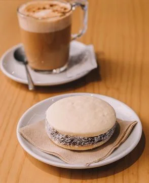 Cornstarch, coconut and dulce de leche alfajor, typical South American Stock Photos