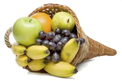 A cornucopia basket filled with delicious fresh fruit Stock Photos