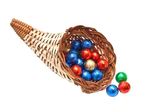Cornucopia of chocolate balls  isolated on white background Stock Photos