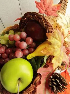 Cornucopia filled with fruit Stock Photos
