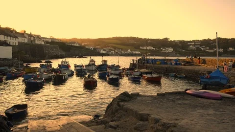 Cornwall England 14th September 2019 Coverack harbour in the evening light Stock Footage 117507953