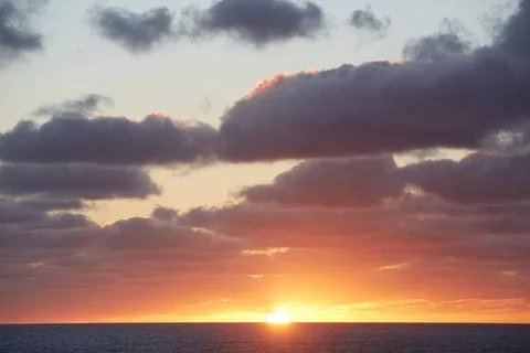 Cornwall, UK - Sunset with dramatic sky at Land`s End Stock Photos