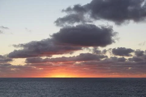 Cornwall, UK - Sunset with dramatic sky at Land`s End Stock Photos