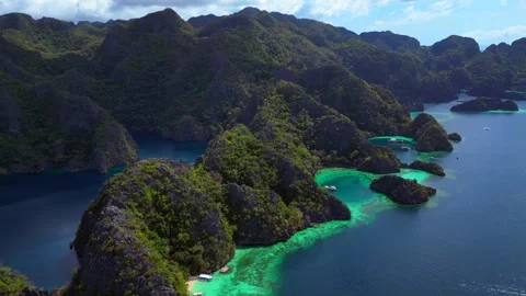 Coron Lagoon with limestone karsts turquoise waters. Nice aerial view drone Stock Footage 344617533