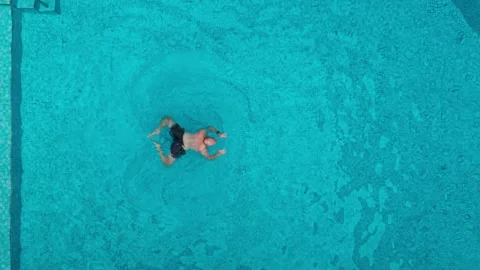 Coron Palawan Pool Aerial - Man Swimming In Blue Water Top View Scene Stock Footage 333920347