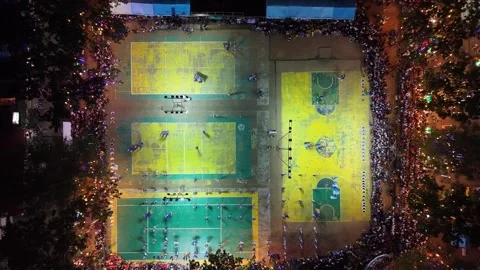 Coron, Philippines - Dec 13, 2025: Mass drumming on basketball court Stock Footage 325794787