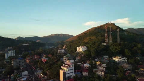 Coron Town aerial pull back revealing mountains at sunset Philippines Stock Footage 323442770